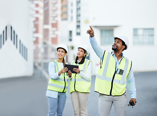 Image showing Construction, planning and architects talking about a building project together with a tablet. Team of engineer employees speaking about maintenance to property with a strategy on technology