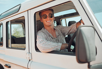 Image showing Travel, driving and adventure man in a caravan for outdoor nature journey, holiday in summer or vacation with sunglasses portrait. Young man in a van or car transport for a drive in countryside life
