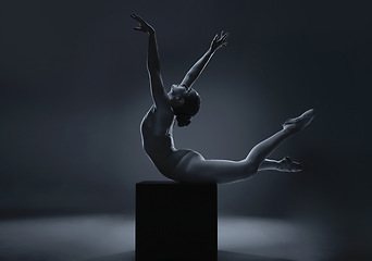 Image showing Art, ballet and woman silhouette posing in black studio for art deco, flexible, abstract and creative. Design, body and model stretching and showing freedom pose while fall and balance on structure