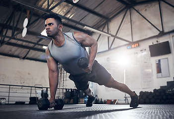 Image showing Man fitness dumbbell training, health workout and lifestyle or sport wellness motivation. Focused health athlete, fit active lifestyle and muscle build strength technique with gym exercise equipment