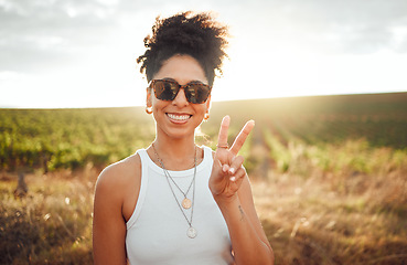 Image showing Peace sign, travel and black woman on safari holiday during summer in Kenya. Portrait of a happy, relax and African girl with hand for photo, adventure and happiness on vacation in the countryside