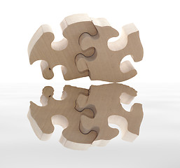 Image showing wooden puzzle with reflection