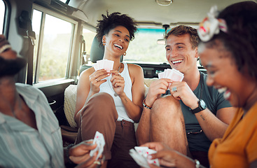 Image showing Friends, car road trip and game of card for diversity group of people bond and enjoy quality vacation time together. Transport travel, freedom smile and happy gen z students play fun match on holiday