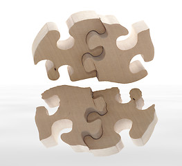 Image showing wooden puzzle with reflection