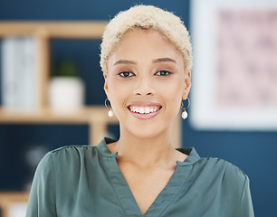 Image showing Happy, smile and young black business woman, entrepreneur and employee in modern office of New York. Portrait face of creative startup manager working motivation, vision and trust in marketing agency