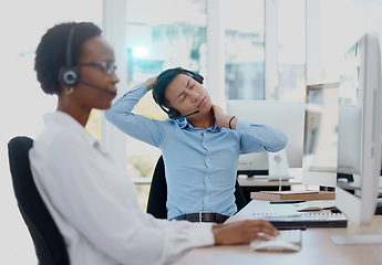 Image showing Call center, businessman and neck pain, stress and injury at office desk in sales agency. Worker burnout, joint pain problem and young asian consultant stretching body posture, health risk or anxiety