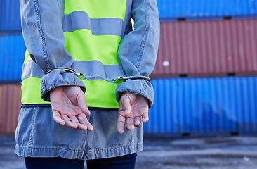 Image showing Hands, man and arrest of engineer in handcuffs for theft, crime or fraud. Corruption, law and logistics, shipping or container worker or criminal in hand cuffs arrested for bribery, scam or stealing.