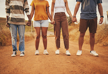 Image showing Support, teamwork and friends holding hands in summer for road trip vacation for community, collaboration and mission together. Networking, growth and goals with group of people on holiday safari
