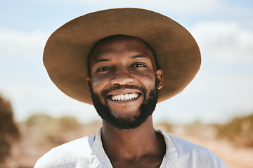 Image showing Portrait, black man smile and travel for holiday, vacation and on countryside outdoor. Happy face, young confident male and casual cool hat look relax, peaceful and on adventure for summer road trip.