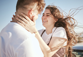 Image showing Road trip, couple and happy to travel with love and adventure together on summer vacation, hugging and smile. Young man and woman, romantic getaway and affection, intimacy and carefree in nature.