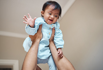 Image showing Love, family and baby with down syndrome playing and having fun with father in a bedroom, bonding and relax together. Development, growth and curious girl with disability enjoy time with parent