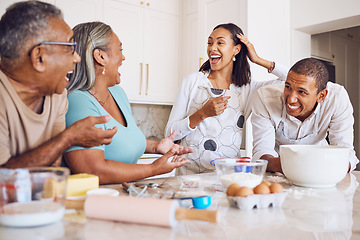 Image showing Black family, kitchen and happy for cooking, baking and bonding in home. Family, comic and conversation for happiness, love and time together on holiday, vacation or break to relax, talking and fun