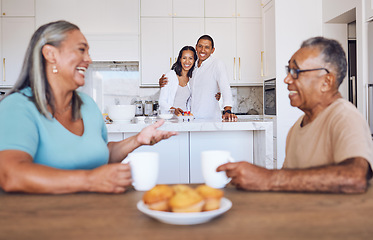 Image showing Family, coffee and senior parents talking at living room table with children listening to their story in house. Comic and elderly man and woman speaking about retirement with drink of tea and kids