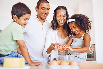 Image showing Mother, father and children learning baking as a happy family together teaching siblings to bake cakes. Mom, dad and kids cracking eggs, cooking and parents helping boy and girl in child development