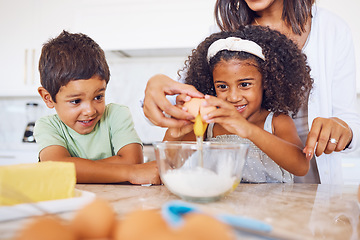 Image showing Cooking, food and children with a girl and boy baking or learning in the kitchen of their home together with mom. Kids, egg and bake with a mother teaching a brother and sister how to make cake mix