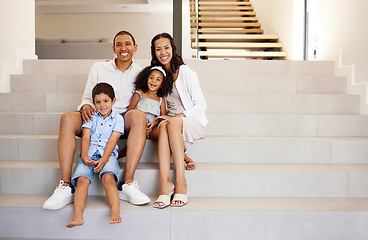 Image showing Family, stairs and smile in new home, property or mansion together for mockup portrait. Parents, children and happy in luxury house, real estate or apartment with happiness on face while on staircase