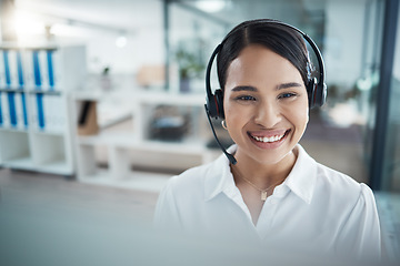 Image showing Woman, smile and crm in call center, customer service and communication at office. Customer support, help and contact us at work for consulting, support or telemarketing with pc online as consultant