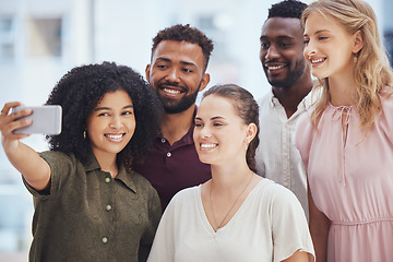 Image showing Phone, selfie and friends with a business team taking a photograph for social media together in the office. Teamwork, mobile and internet with a female employee and colleague posing for a picture