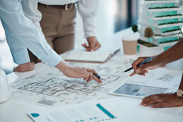 Image showing Architect, hands and planning building on paper for construction design or layout at the office. Group hand of employee in teamwork project plan for architecture working on model build or blueprint