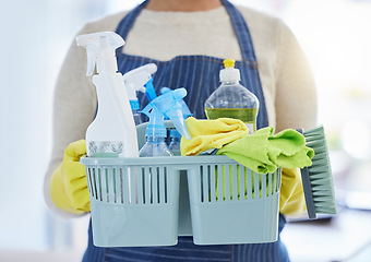 Image showing Woman, housekeeping products and cleaning container for home cleaner service, office maid and worker. Zoom on spray bottle, brush and fabric cloth for home spring clean and house hygiene maintenance