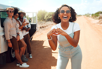 Image showing Heart, hands and black woman with love for road trip with friends in the countryside of California. Portrait of an African girl on safari holiday with people with support for adventure in the desert