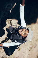 Image showing Hiking, black woman or rock climbing on mountain for workout or fitness. Girl, health and exercise for training, sport or wellness on adventure in nature in summer on hill, hiker or stone in Canada