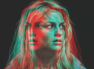 Image showing Psychology, bipolar and motion blur psychedelic of woman with mental health fear, insomnia and anxiety on dark background. Overlay of split emotions, schizophrenia and surreal horror of crazy face