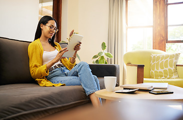 Image showing Woman, networking or communication with tablet on sofa for social media app, search or contact us on website. Technology, female with glasses in house for email, internet or ecommerce shopping