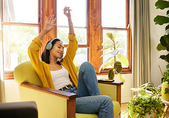 Image showing Relax, woman and headphones music in living room for feel good listening leisure in Cancun home. Happy Mexican girl enjoying musical streaming app dancing with arms and eyes closed in lounge.