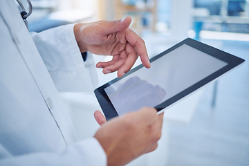 Image showing Hands, tablet and healthcare with a doctor doing research with a search on the internet for insurance or medical innovation. Health, medicine and analytics with a male surgeon working in a hospital