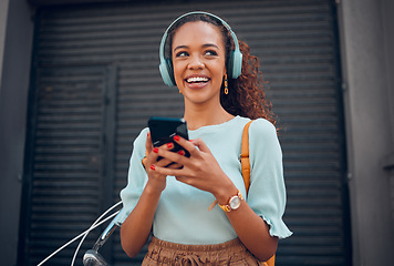 Image showing Black woman, smile and phone for social media in the city with headphones in joy for 5G connection in the outdoors. Happy African female student smiling for technology or internet on smartphone