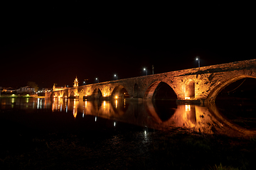 Image showing Bridge crossing the Rio Lima at night