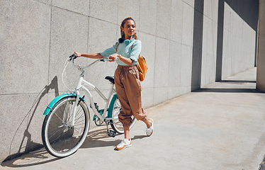 Image showing Bike, young city woman and use bicycle on a summer day outdoor with trendy fashion, edgy or casual look. Girl relax, riding and lower carbon footprint for sustainability or eco friendly transport