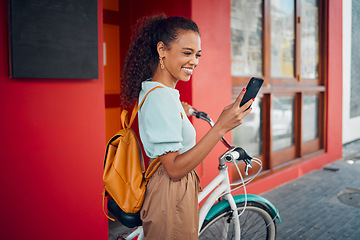 Image showing Phone, bike and travel with a woman on social media while pushing her bicycle through the city on a trip. Mobile, cycling and transport with a young female traveling abroad or overseas alone
