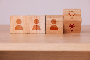 Image showing Wood, game and blocks for equality, human rights and gender on desk. Lgbt, transgender and tolerance with wooden cube with sign for man, woman and equal opportunity, education and learning for people