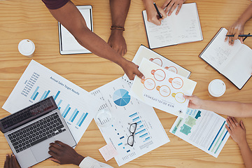 Image showing Hands table with finance paper, graphs and big data during teamwork meeting with accounting or marketing team. Above planning budget, laptop or growth development zoom in of seo team doing research