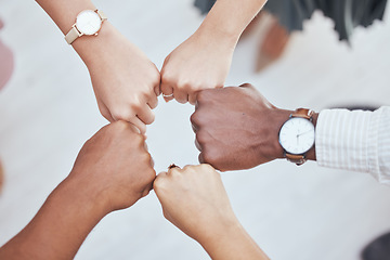 Image showing Fist in circle, corporate team building and diversity in business employee teamwork for support or group motivation. Company staff, hands together and show people solidarity or collaboration at work