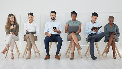 Image showing Business people, diversity and waiting room in networking or social media at the office with technology in the workplace. Diverse group of creative workers for interview, line and company recruitment