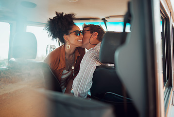 Image showing Love, couple and cheek kiss on road trip, vacation or summer holiday trip. Sunglasses, diversity and man kissing woman, affection or bonding, care or romance on car drive and spending time together.