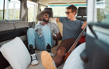 Image showing Comic, smile and friends on a road trip in a van for a holiday on the countryside of California together. Happy, freedom and relax men in communication in a car on a vacation for adventure and travel