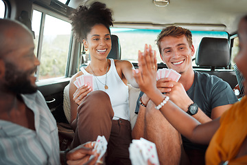 Image showing Card game, car and friends high five on a road trip enjoy holidays, vacation or fun weekend together. Winner, happy and excited girls celebrate playing, winning or victory with a smile in a caravan