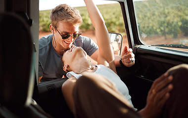 Image showing Love, couple and car road trip in nature on vacation, holiday or summer trip. Travel, interracial woman and man spending time together, affection and bonding, care and romance in countryside outdoors