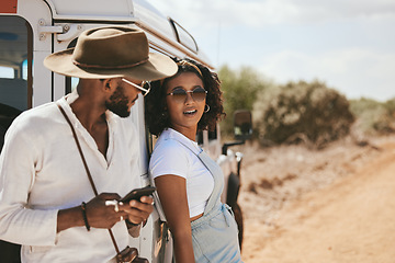 Image showing Road trip, travel and black people with smartphone for safari guide app, location update and social media outdoor journey post with 5g network. Gen z couple with cellphone and caravan in countryside