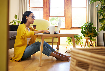 Image showing Woman in business work from home, on laptop working a document on laptop and paperwork for corporate strategy. Young, professional and entrepreneur, market research for startup and industry data