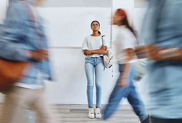 Image showing Student, anxiety and woman in busy college campus with depression, sad and mental health problems. Burnout, stress and tired girl thinking about exam, assignment or project deadline at university