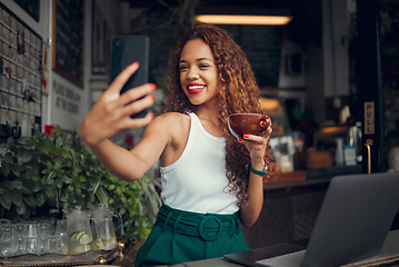Image showing Phone selfie, laptop and black woman with coffee, remote worker or freelancer drinking espresso in cafe. Tea, photo and business woman from Brazil with 5g mobile for happy memory or social media post
