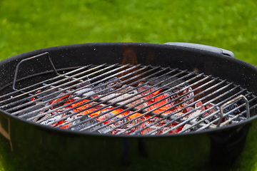 Image showing burning charcoal grill 
