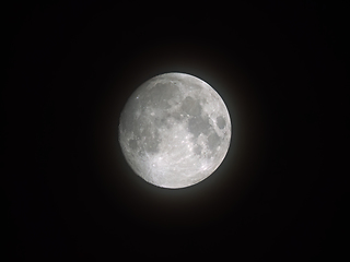 Image showing Waxing Moon Through Hazy Clouds