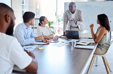 Image showing Black man, speaker and laptop presentation in business meeting, strategy planning and digital marketing global office boardroom. Talking manager, mentor and leadership technology in teamwork training