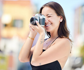 Image showing Photographer, city photography and digital camera woman take urban photoshoot for memory on world, global or international travel. Vacation tour, smile and happy asian girl shooting outdoor Singapore